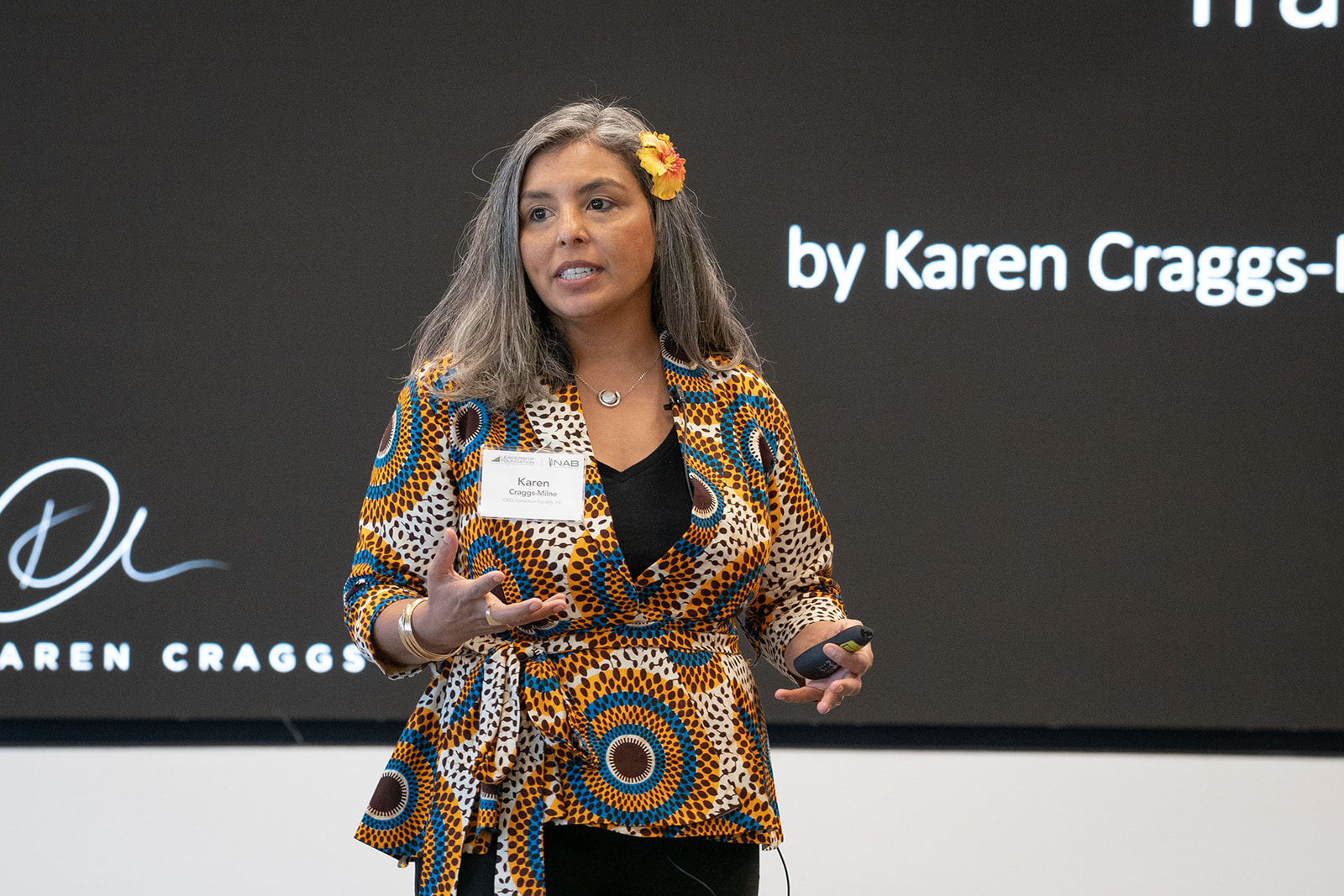 Karen Craggs presenting on stage