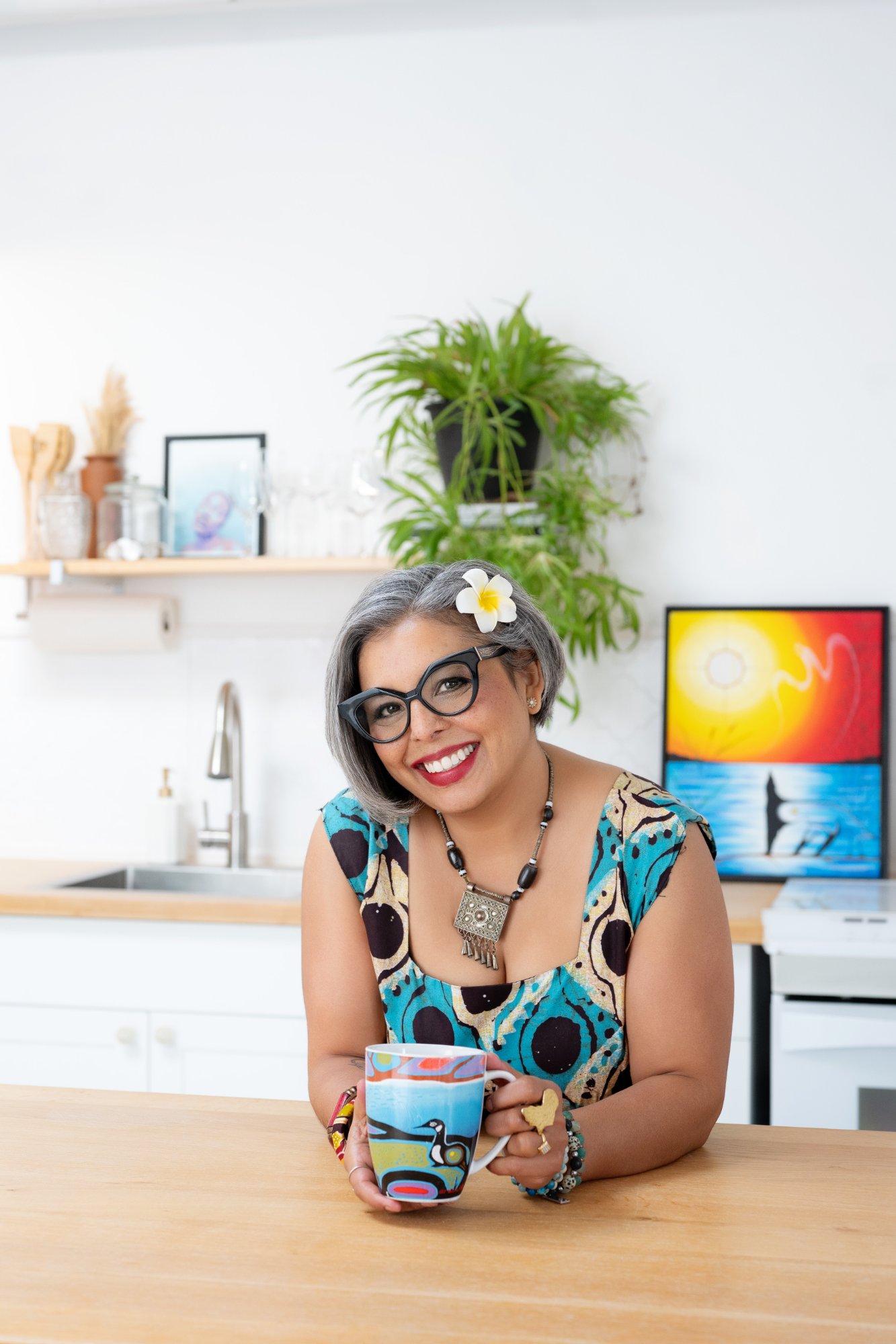 Karen Craggs in kitchen with mug